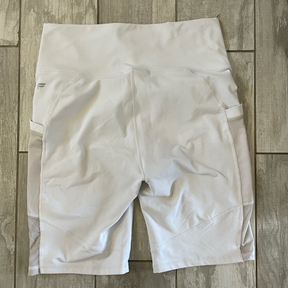 Fabletics white biker short with mesh side and pocket